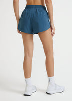 Pantalones cortos reflectantes para mujer