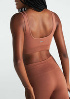 Resplandor de piel de mujer superior