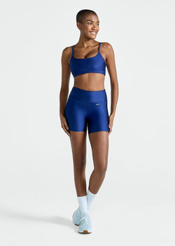 Pantalones cortos ajustados con purpurina y bolsillos para mujer